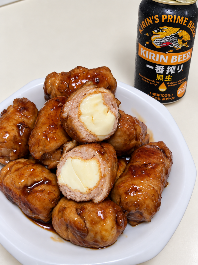 厚揚げを豚こま肉で巻いた甘辛照り焼きとキリン一番搾り黒生