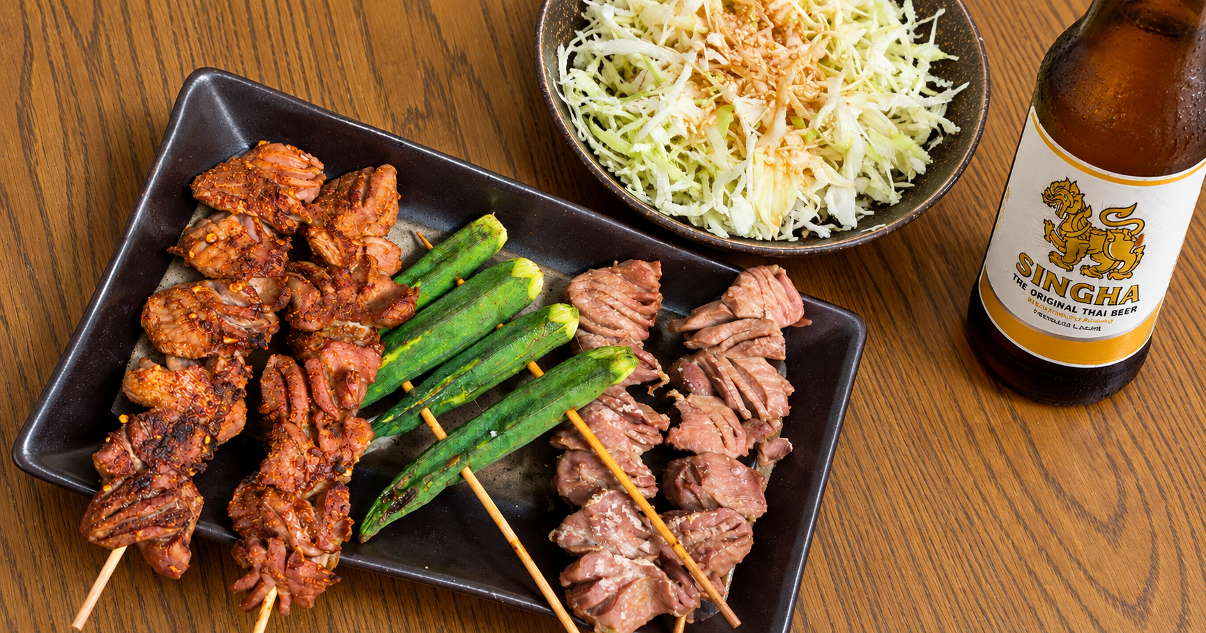 シンハービールと塩味・タコシーズニング味の砂肝串焼きで楽しむ家飲み